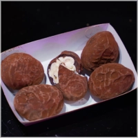 Knapperige chocoladetruffel met een zachte, romige creamflow van binnen